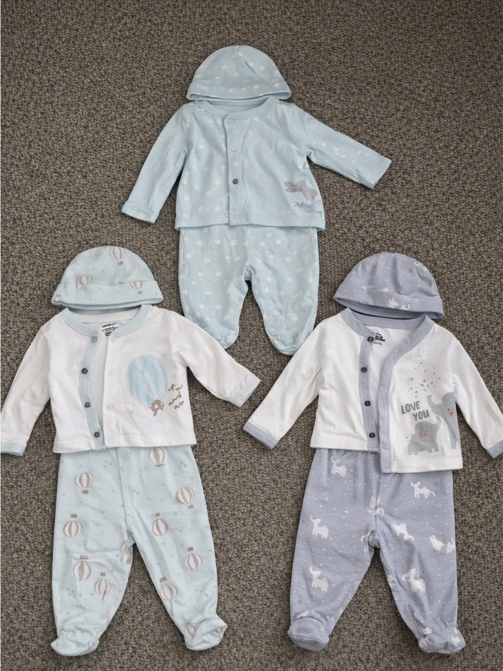 Gerber Three-Pack Baby Pajama Sets in Light Blue, White, and Gray